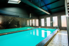 Bungalow met privé zwembad en sauna